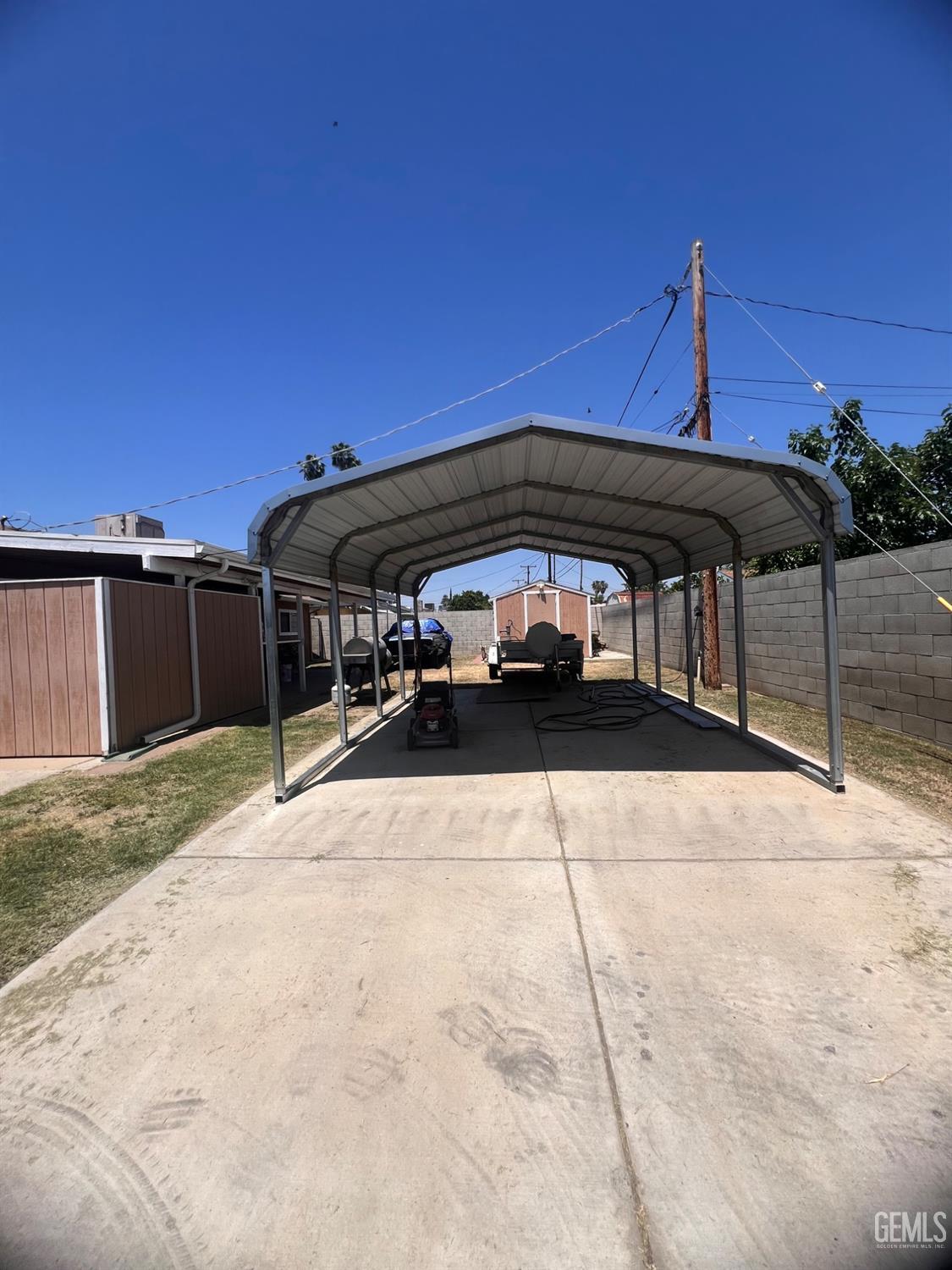 Undisclosed Address Bakersfield, CA 93304 - Photo 11 of 15 a view of street with car parked