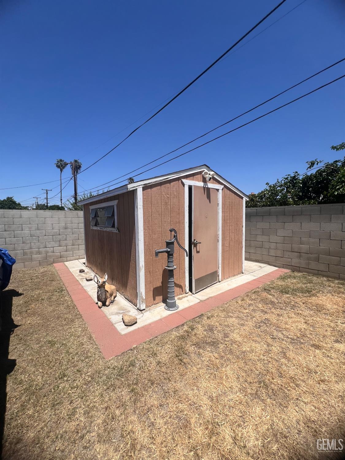 Undisclosed Address Bakersfield, CA 93304 - Photo 13 of 15 a view of a backyard of a house