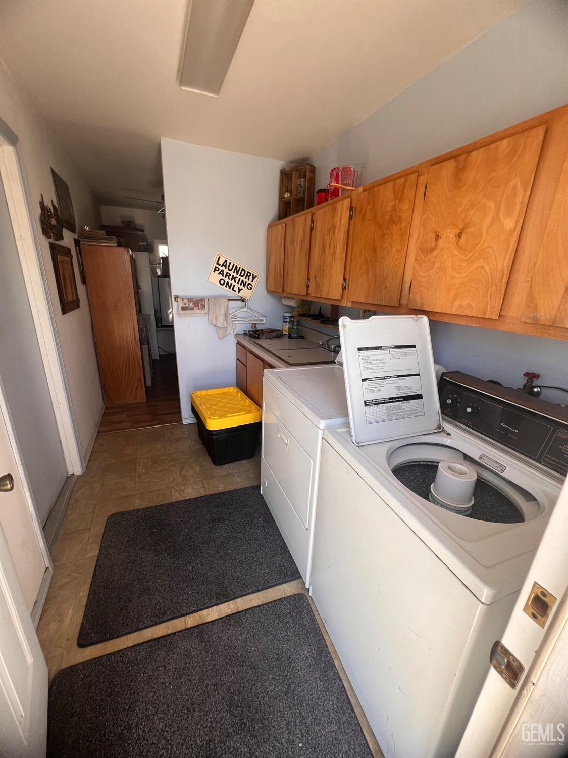Undisclosed Address Bakersfield, CA 93304 - Photo 14 of 15 a storage room with washer and dryer