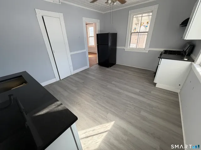 a view of an empty room and window