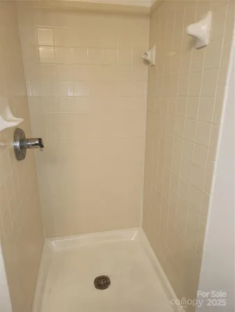 a bathroom with a sink toilet and mirror