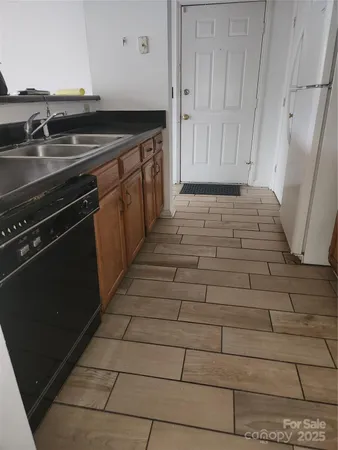 a bedroom with bed and a couch