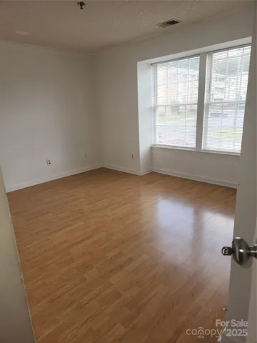 a bathroom with a sink toilet and mirror