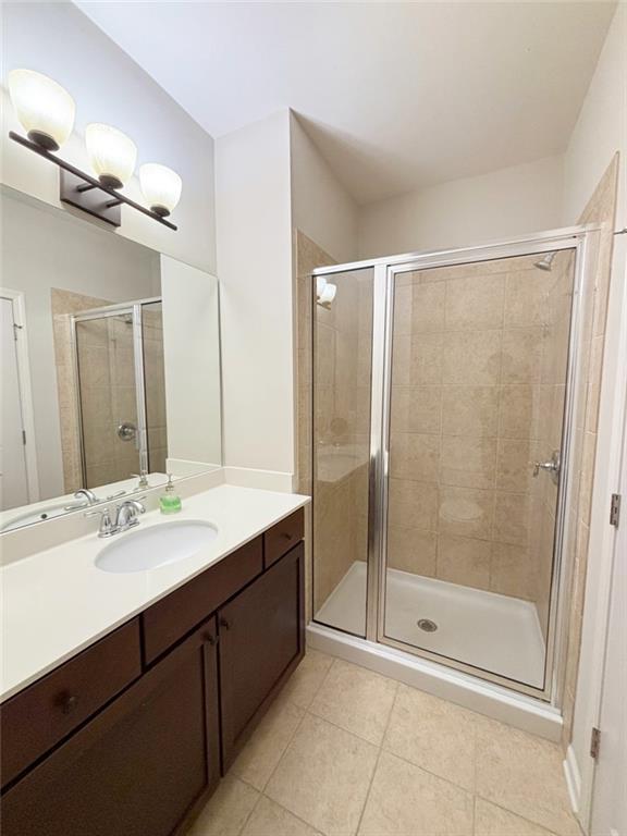 772 Liberty Commons Drive Northwest Atlanta, GA 30314 - Photo 18 of 23 a bathroom with a shower sink vanity and mirror