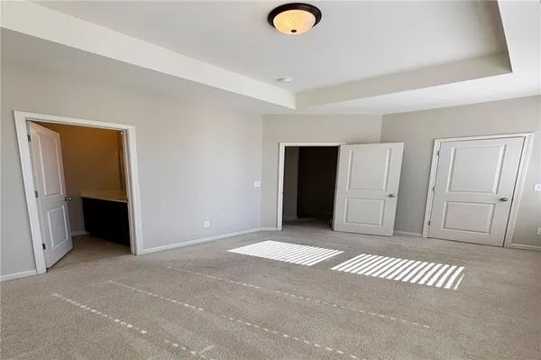 an empty room with sliding door