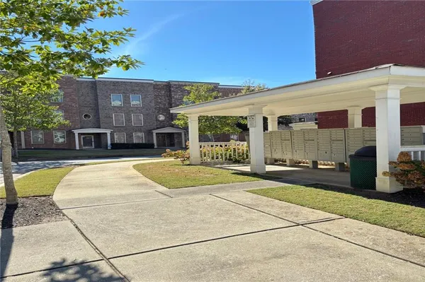 a view of a building with a swimming pool
