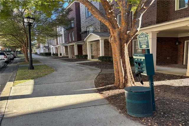 a view of a house with a street