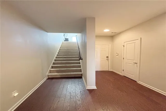 a view of entryway with wooden floor