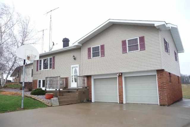 28771 Crabtree Corner Road Cuba City, WI 53807 - Photo 12 of 12 a front view of a house with garage