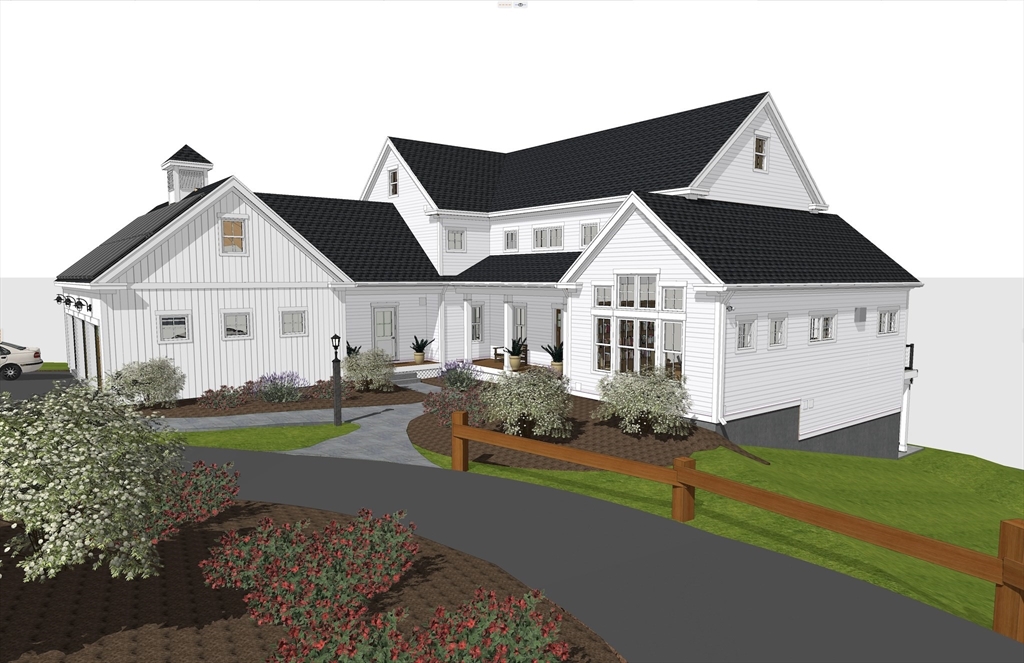 a front view of house with yard and green space