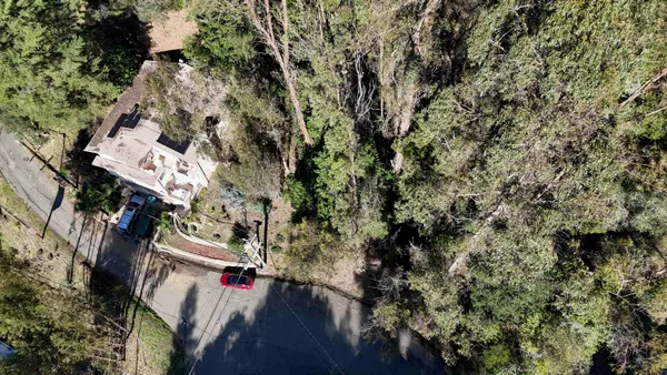an aerial view of residential house with outdoor space