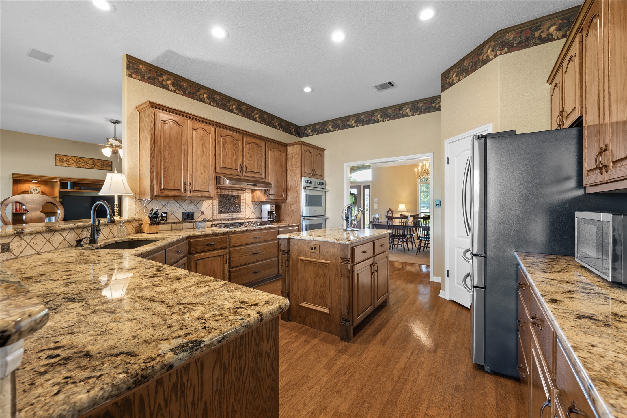 266 Courtnee's Way Georgetown, TX 78626 - Photo 14 of 40 Custom Cabinets, Granite Countertops, Gas Cooktop, Stainless Appliances and walk-in pantry!