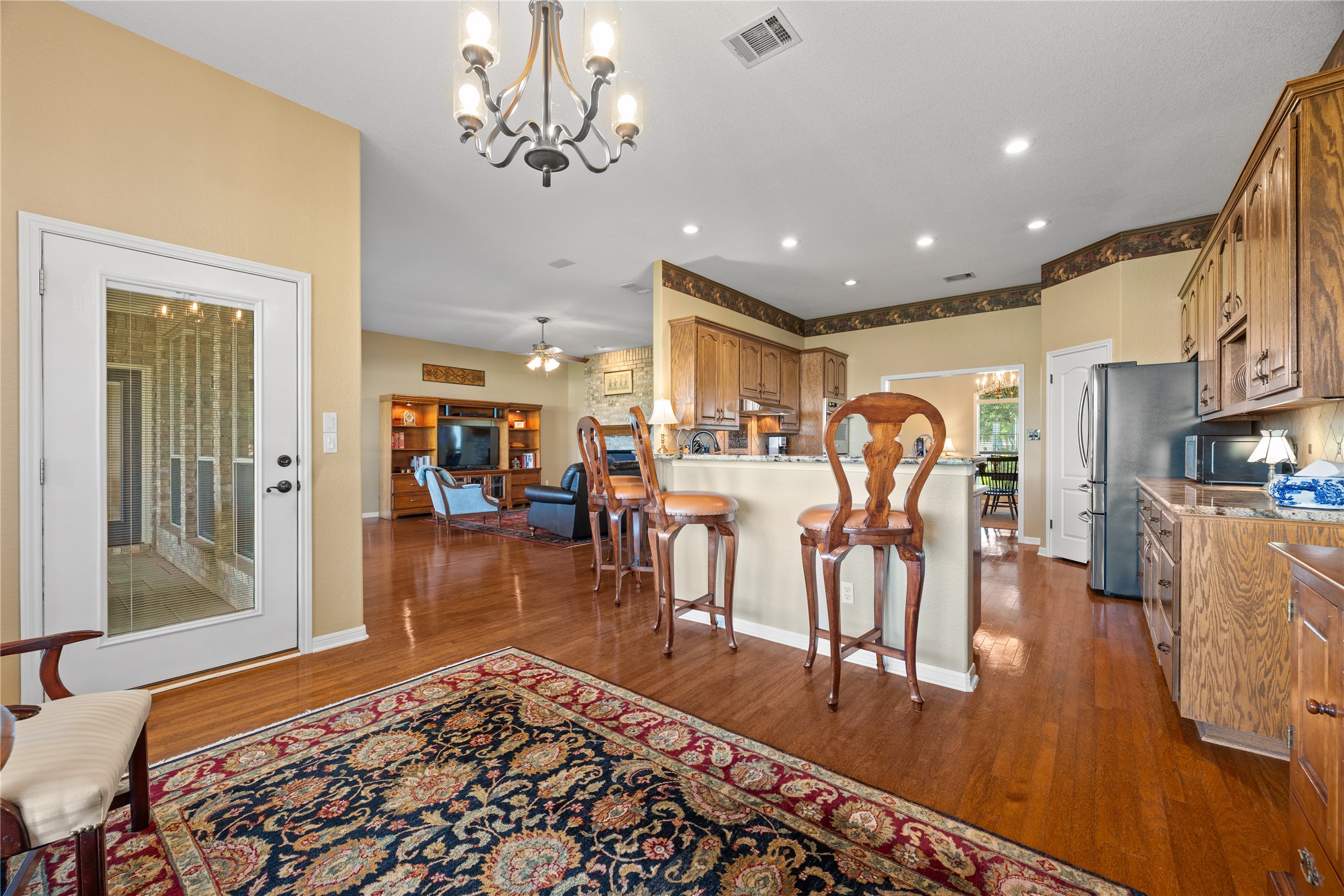 266 Courtnee's Way Georgetown, TX 78626 - Photo 15 of 40 Breakfast Room looking into the kitchen via the Breakfast Bar