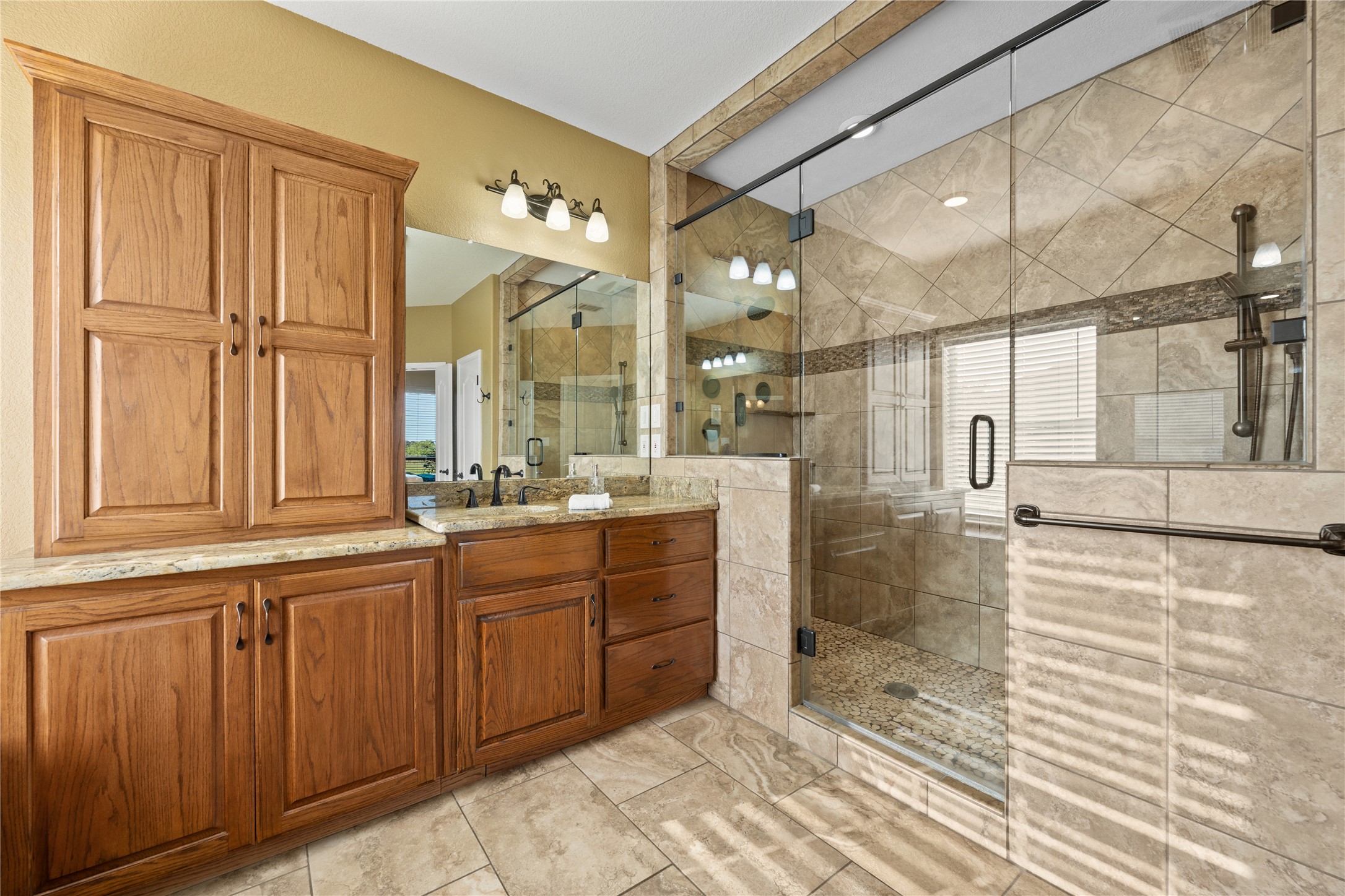 266 Courtnee's Way Georgetown, TX 78626 - Photo 20 of 40 a spa-inspired walk-in shower with temperature control remote and beautiful floor-to-ceiling tiles