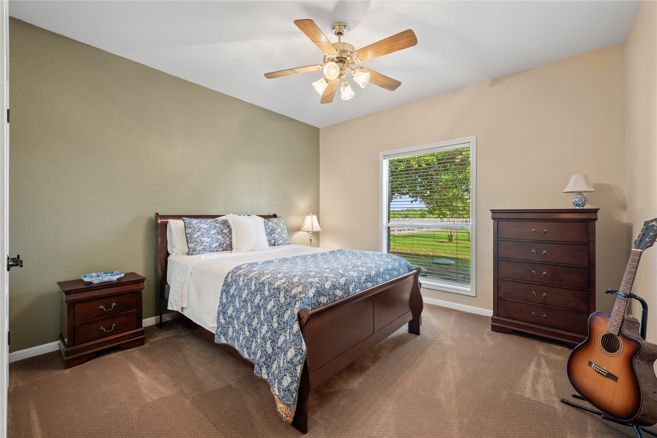 266 Courtnee's Way Georgetown, TX 78626 - Photo 23 of 40 Carpeted room featuring a backyard view, high ceiling and spacious closet.