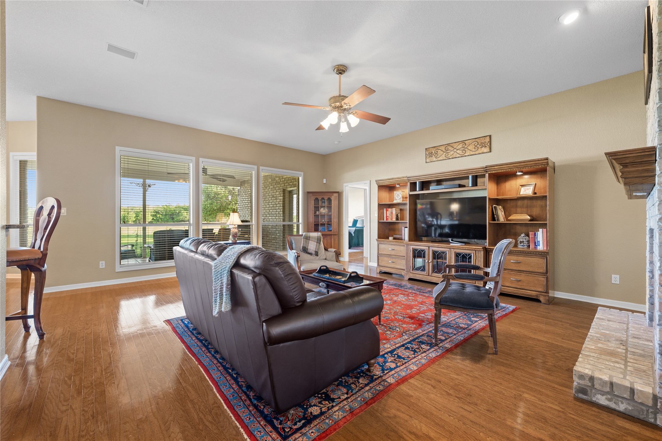 266 Courtnee's Way Georgetown, TX 78626 - Photo 10 of 40 Spacious living area featuring wall of windows with a fantastic private view!