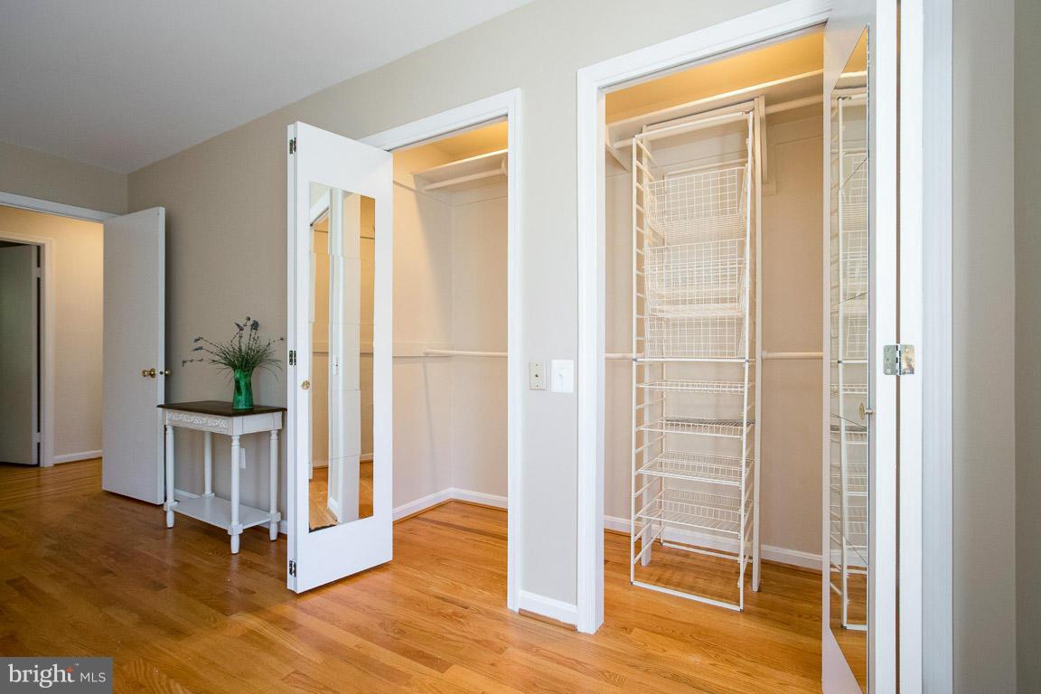10802 Hunt Club Road Reston, VA 20190 - Photo 22 of 30 a view of a livingroom with wooden floor and entryway