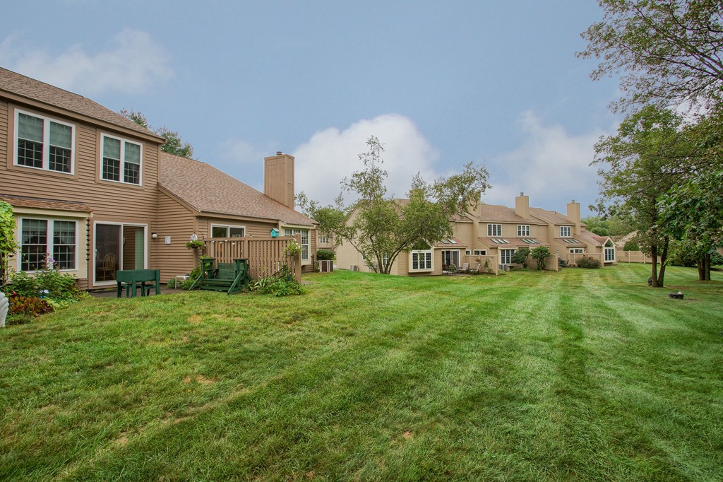 914 Ridgefield Circle, Unit B Clinton, MA 01510 - Photo 24 of 30 a view of a big yard in front of a house