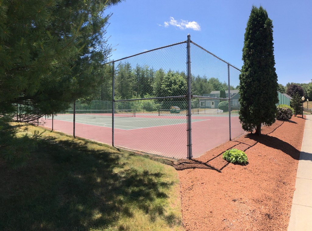 914 Ridgefield Circle, Unit B Clinton, MA 01510 - Photo 28 of 30 a view of a road with a yard