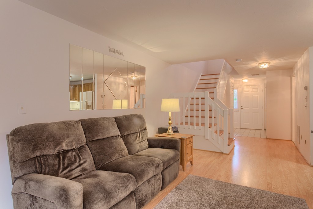 914 Ridgefield Circle, Unit B Clinton, MA 01510 - Photo 10 of 30 a living room with furniture and a couch