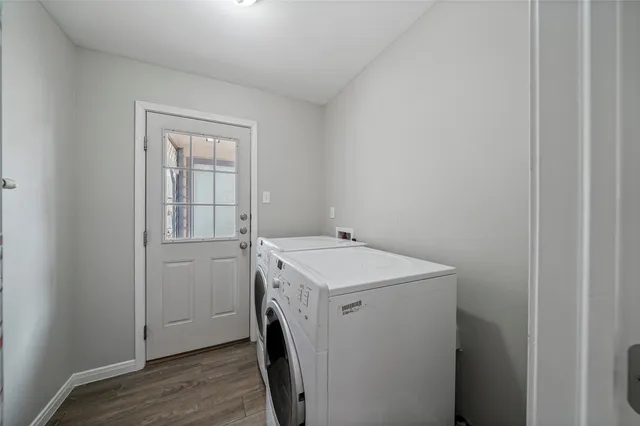 a utility room with dryer and washer