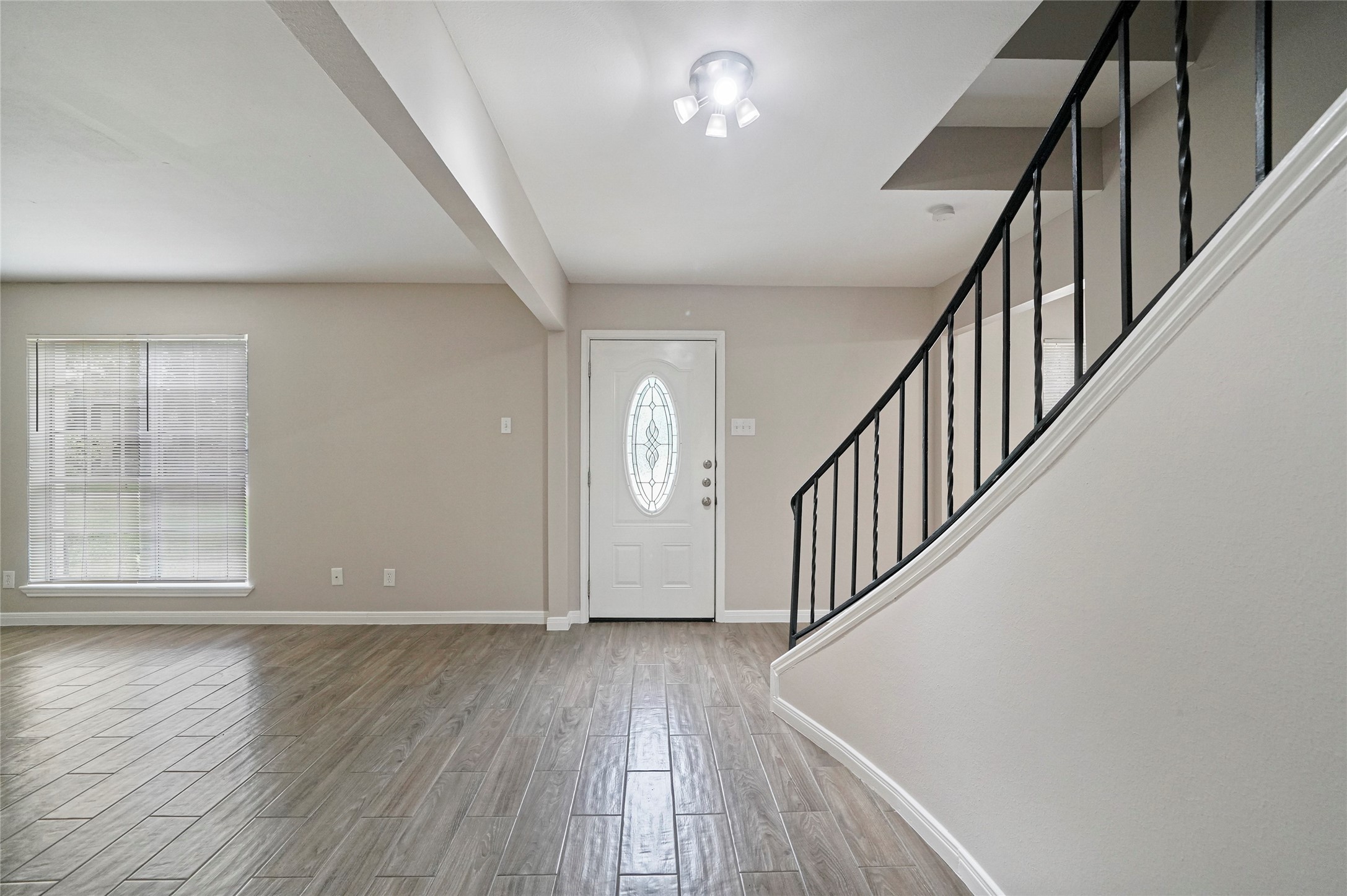 643 Ames Street Spring, TX 77373 - Photo 4 of 32 a view of an entryway with wooden floor