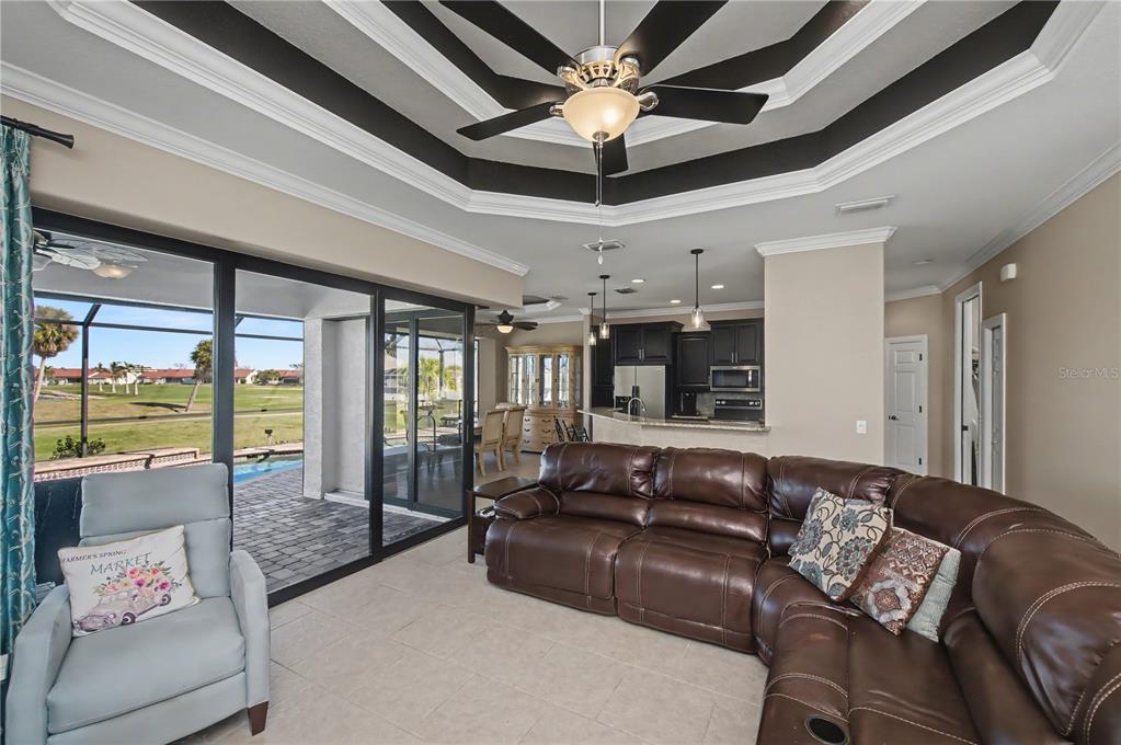 1736 Suzi Street Punta Gorda, FL 33950 - Photo 14 of 80 a living room with furniture and a large window