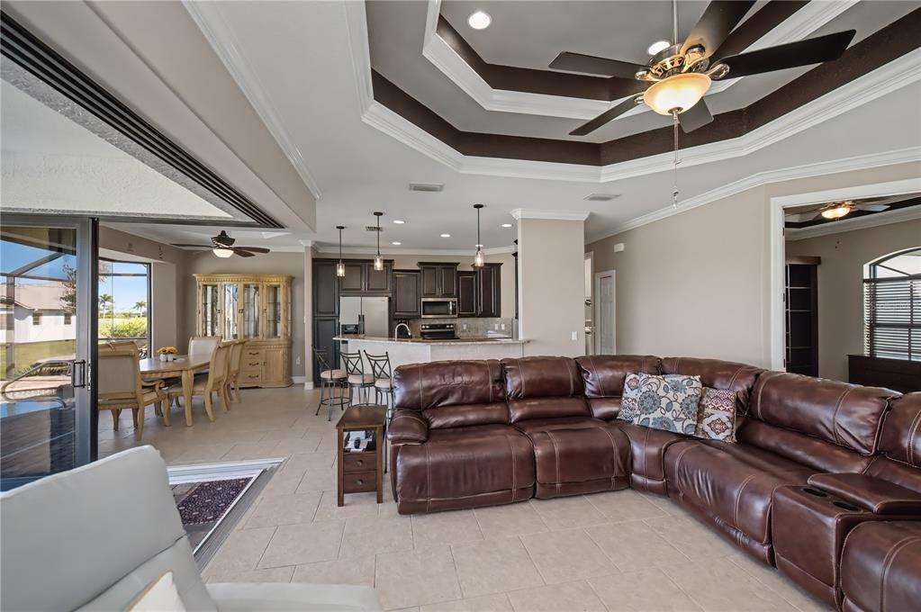 1736 Suzi Street Punta Gorda, FL 33950 - Photo 18 of 80 a living room with furniture ceiling fan and a rug