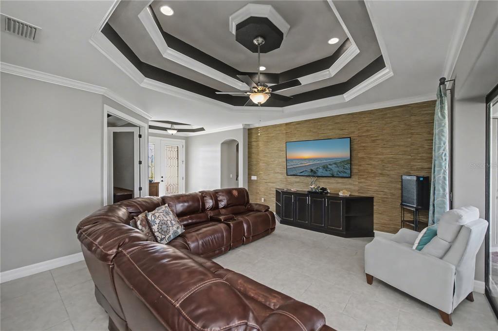 1736 Suzi Street Punta Gorda, FL 33950 - Photo 19 of 80 a living room with furniture and a flat screen tv