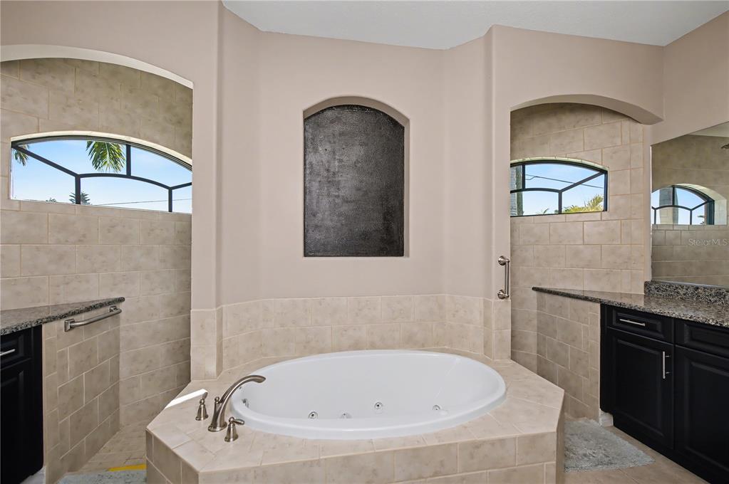 1736 Suzi Street Punta Gorda, FL 33950 - Photo 39 of 80 a bathroom with a tub and a sink