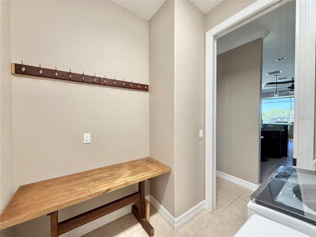 1736 Suzi Street Punta Gorda, FL 33950 - Photo 51 of 80 a view of a room with wooden floor and staircase