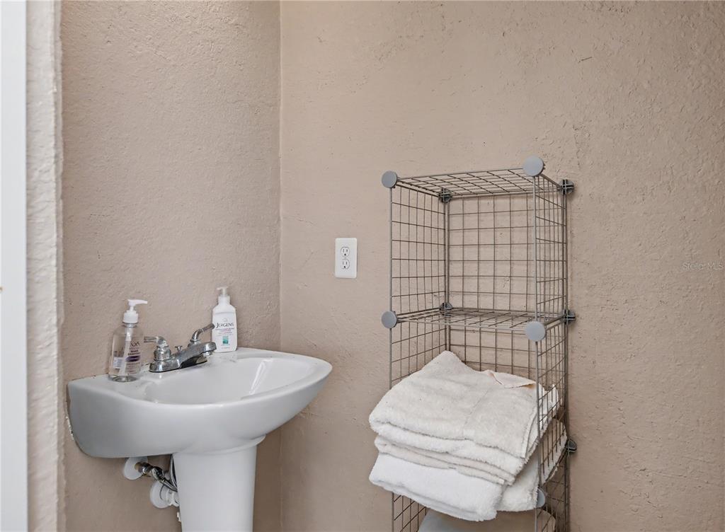 1736 Suzi Street Punta Gorda, FL 33950 - Photo 56 of 80 a bathroom with a sink toilet and shower