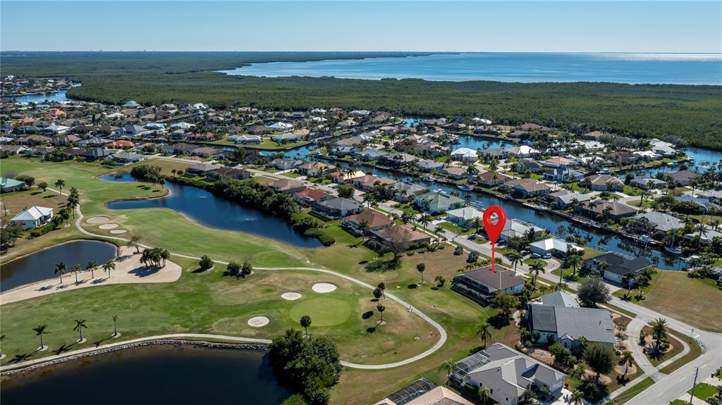 1736 Suzi Street Punta Gorda, FL 33950 - Photo 8 of 80 an aerial view of a house with a ocean view