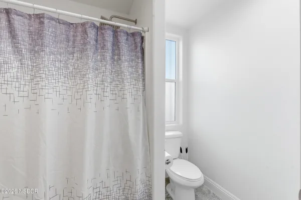 a bathroom with a sink double vanity and a shower