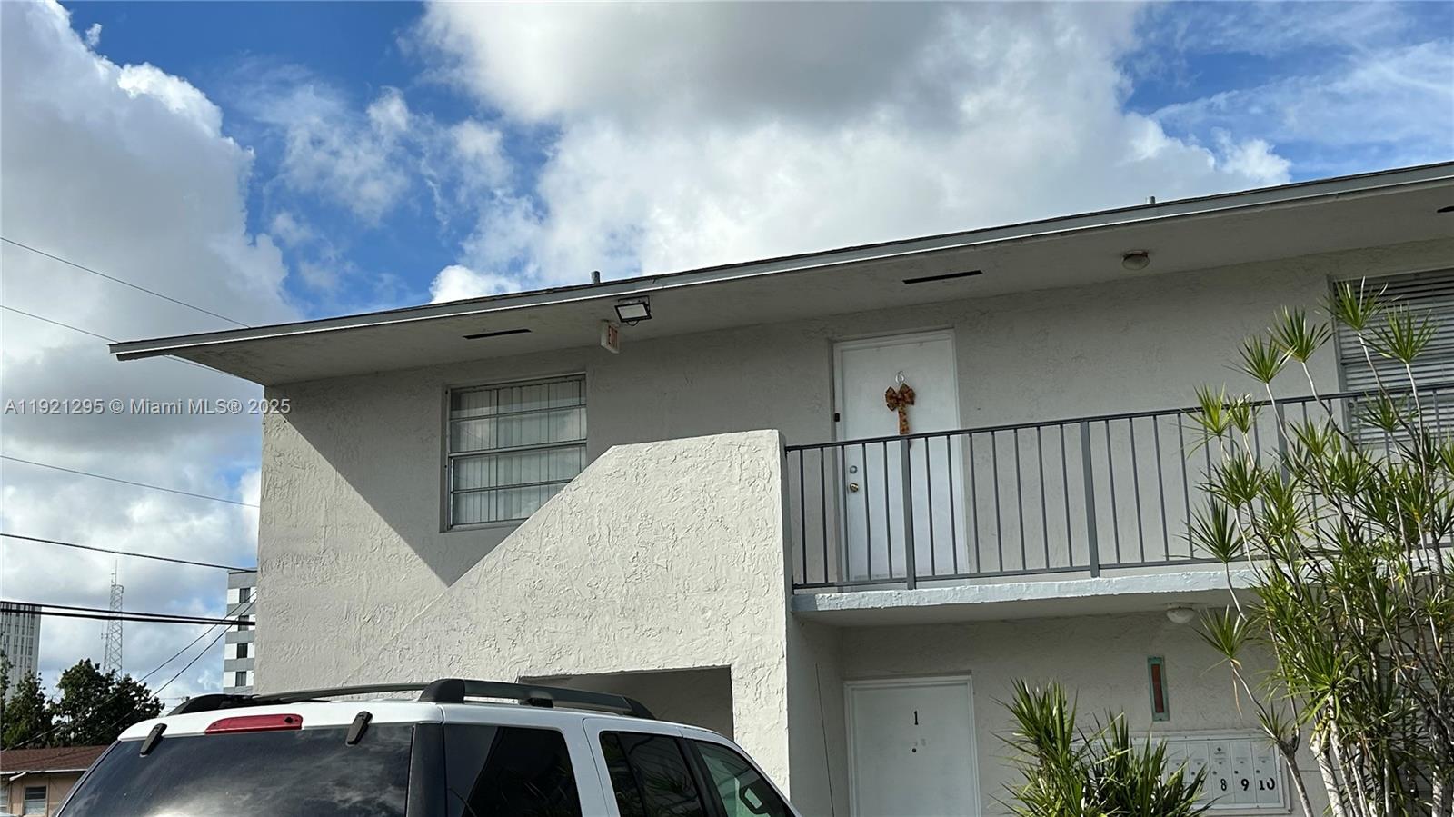 10745 Southwest 3rd Street, Unit 6 Sweetwater, FL 33174 - Photo 5 of 5 a view of entryway with wooden floor