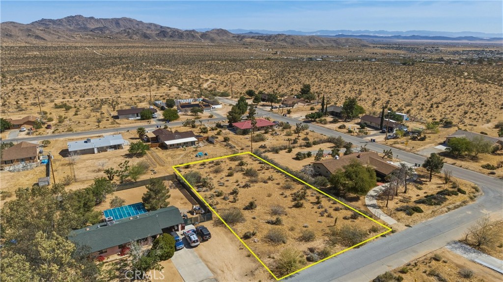 0 Adobe Joshua Tree, CA 92252 - Photo 4 of 13 an aerial view of ocean and residential houses with outdoor space