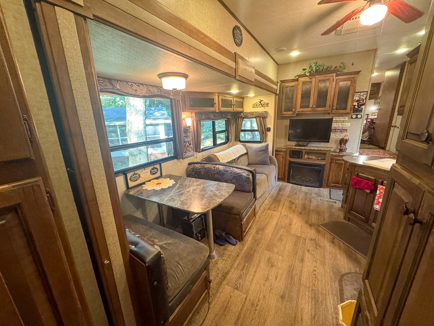 24-52 Woodhaven Sublette, IL 61367 - Photo 12 of 22 a view of a dining room with furniture wooden floor and fan