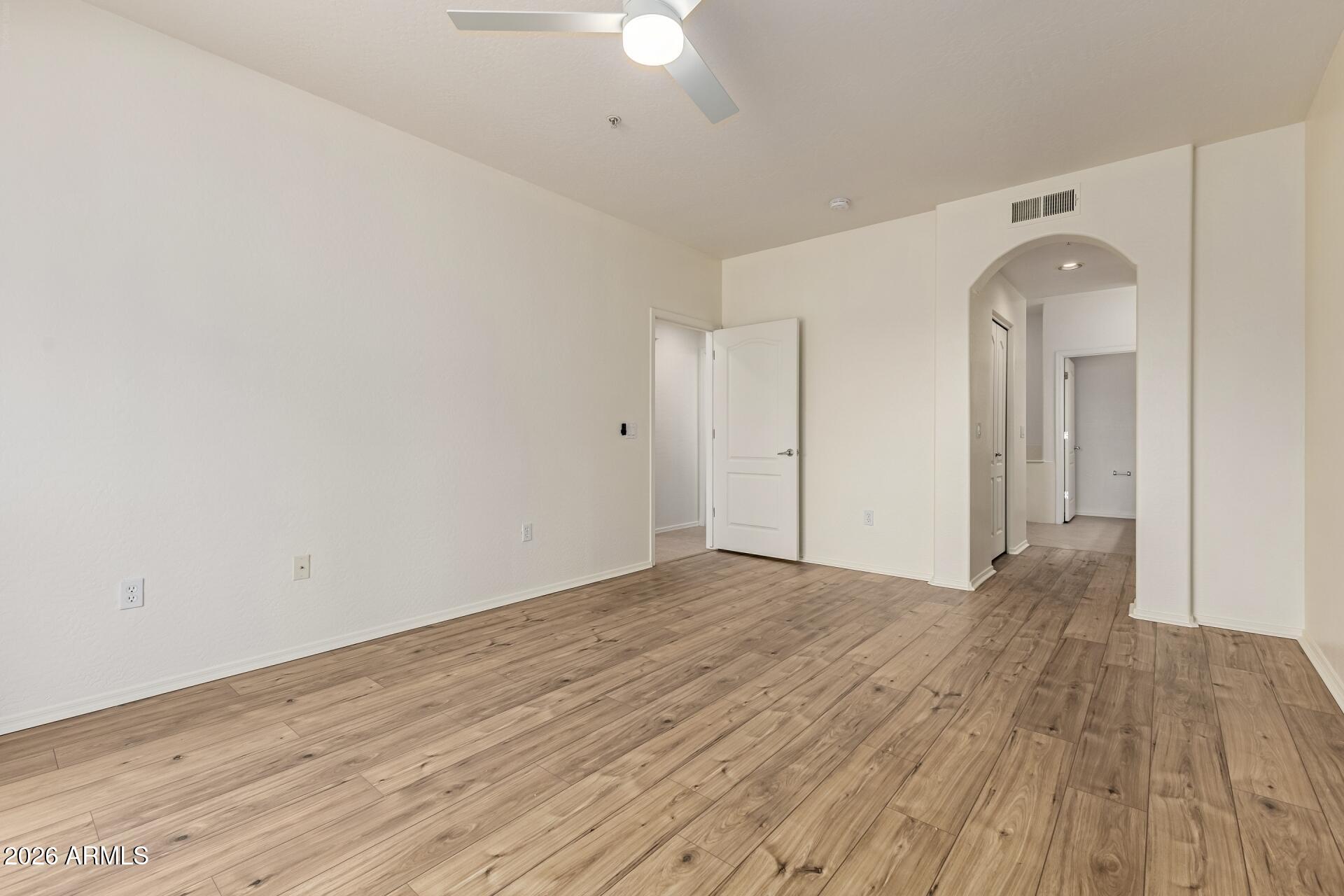 705 West Queen Creek Road, Unit 1167 Chandler, AZ 85248 - Photo 16 of 31 a view of empty room with wooden floor