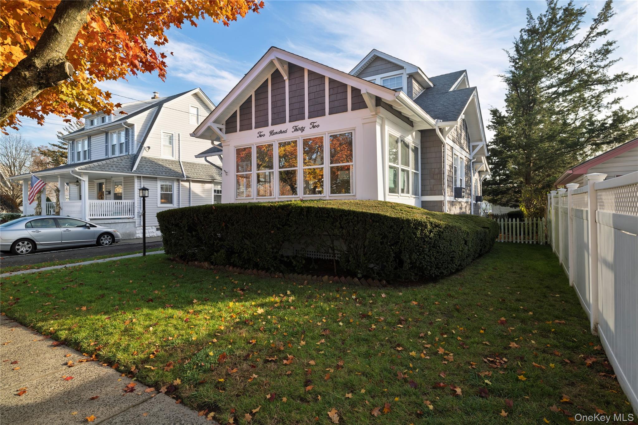 232 Sherman Street Lynbrook, NY 11563 - Photo 2 of 22 a view of a house with a yard