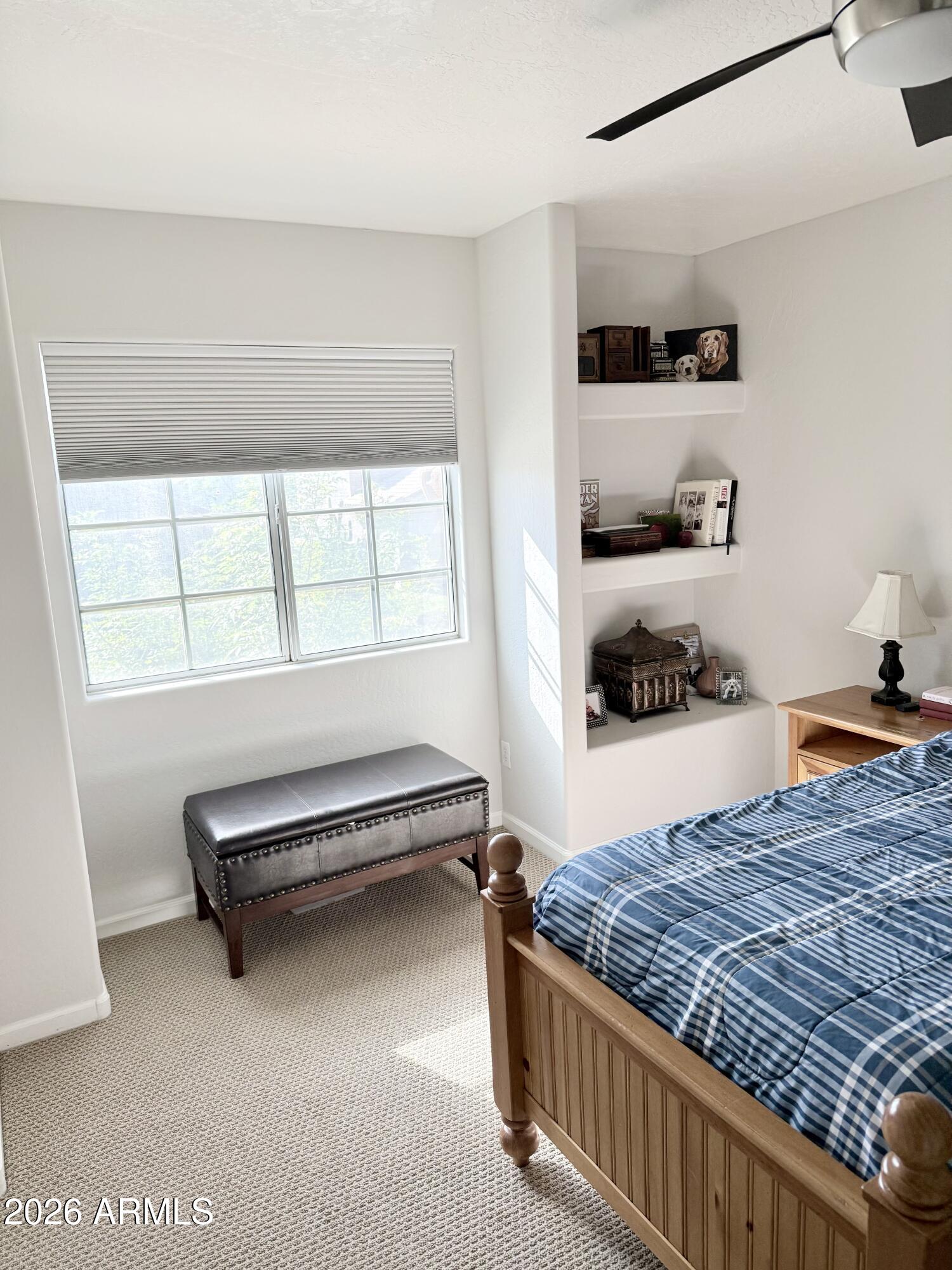 3426 East Clark Road Phoenix, AZ 85050 - Photo 32 of 48 a bedroom with a bed and a window