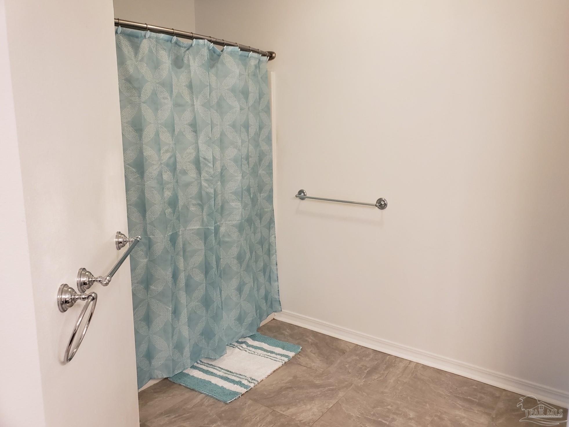 1767 Condor Drive Cantonment, FL 32533 - Photo 9 of 14 a bathroom with a shower