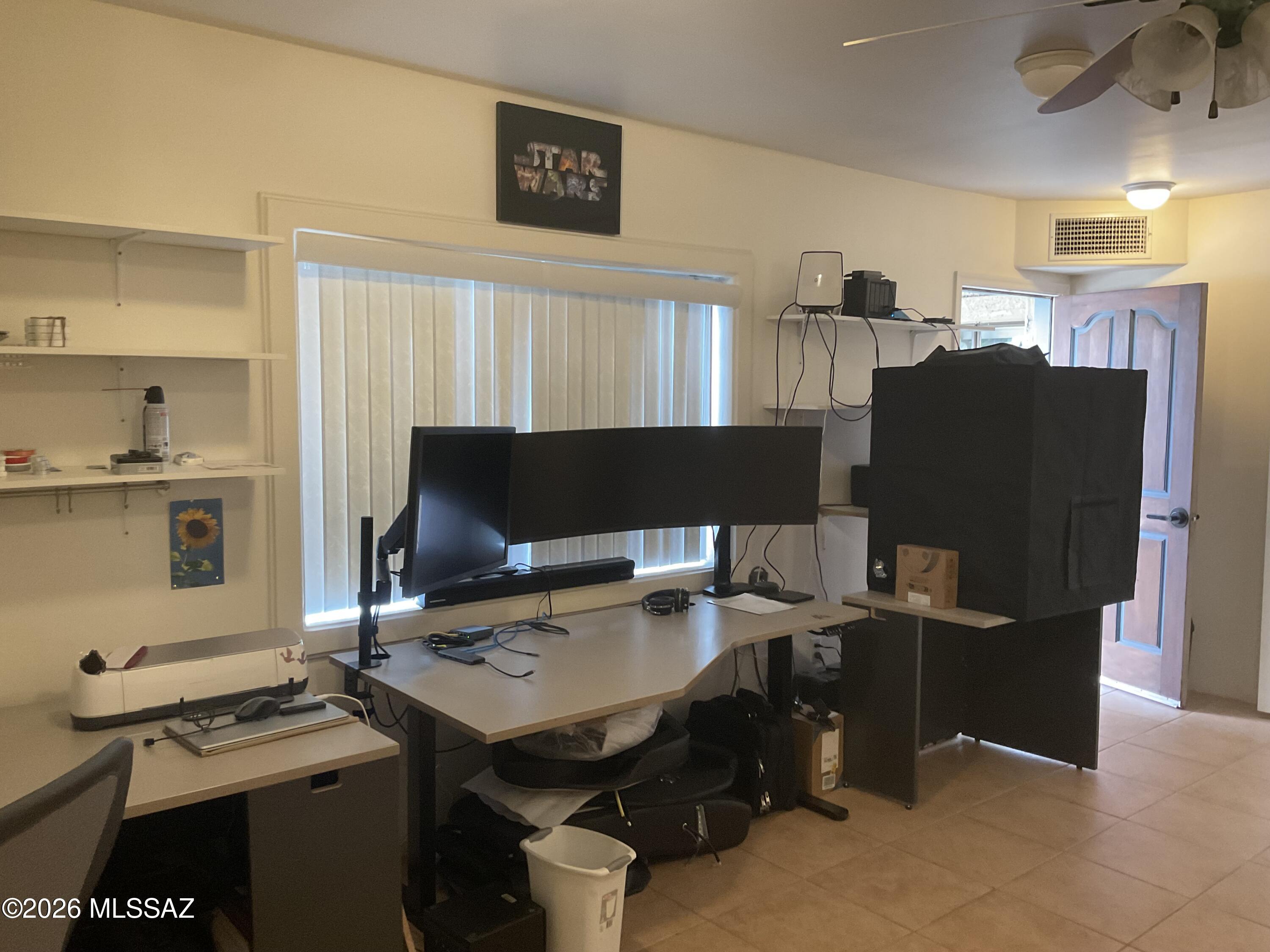 4060 North Swan Road Tucson, AZ 85718 - Photo 9 of 47 a view of a workspace with furniture