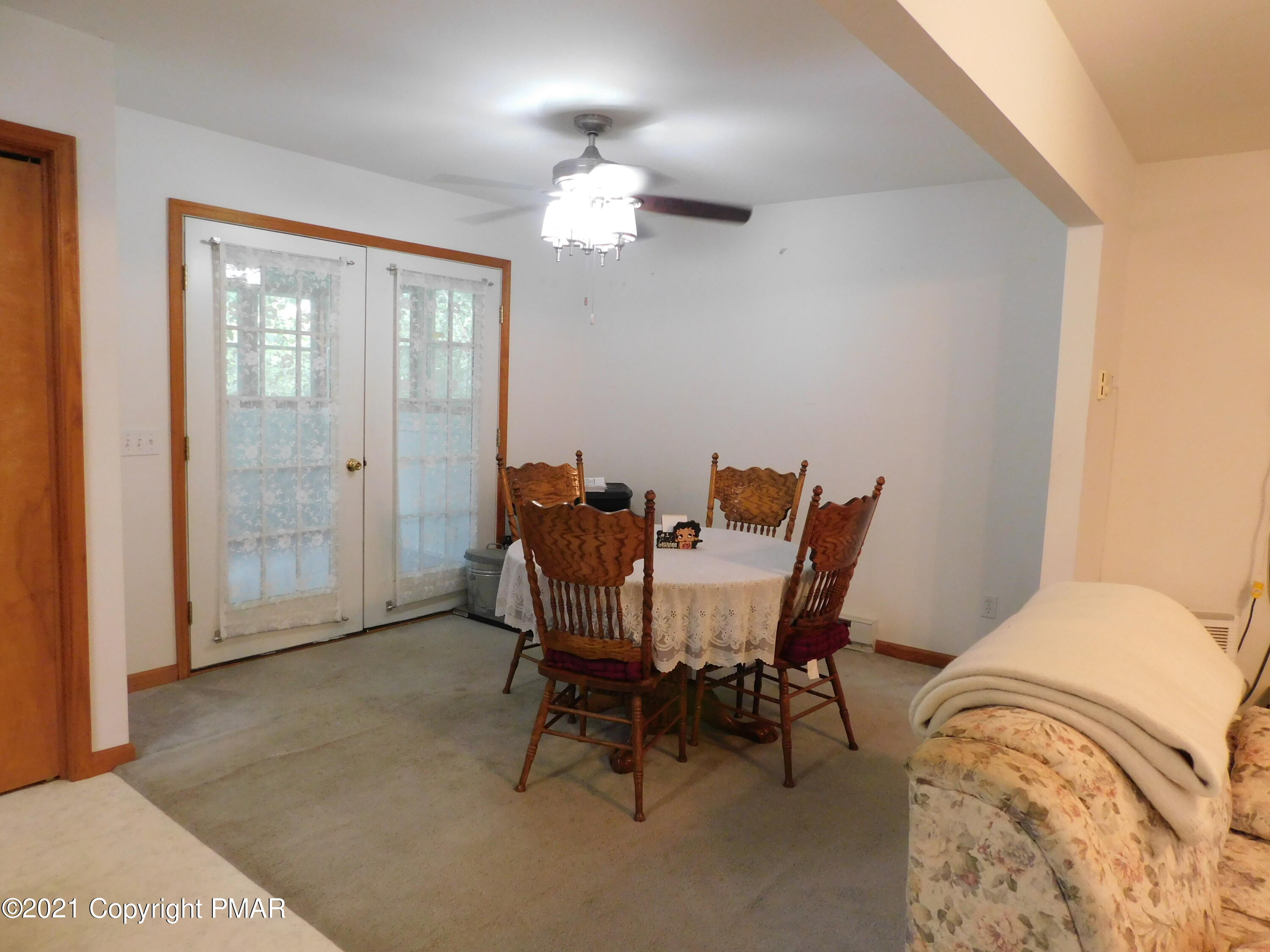 1051 Hampstead Road Bushkill, PA 18324 - Photo 26 of 40 a view of a dining room with furniture