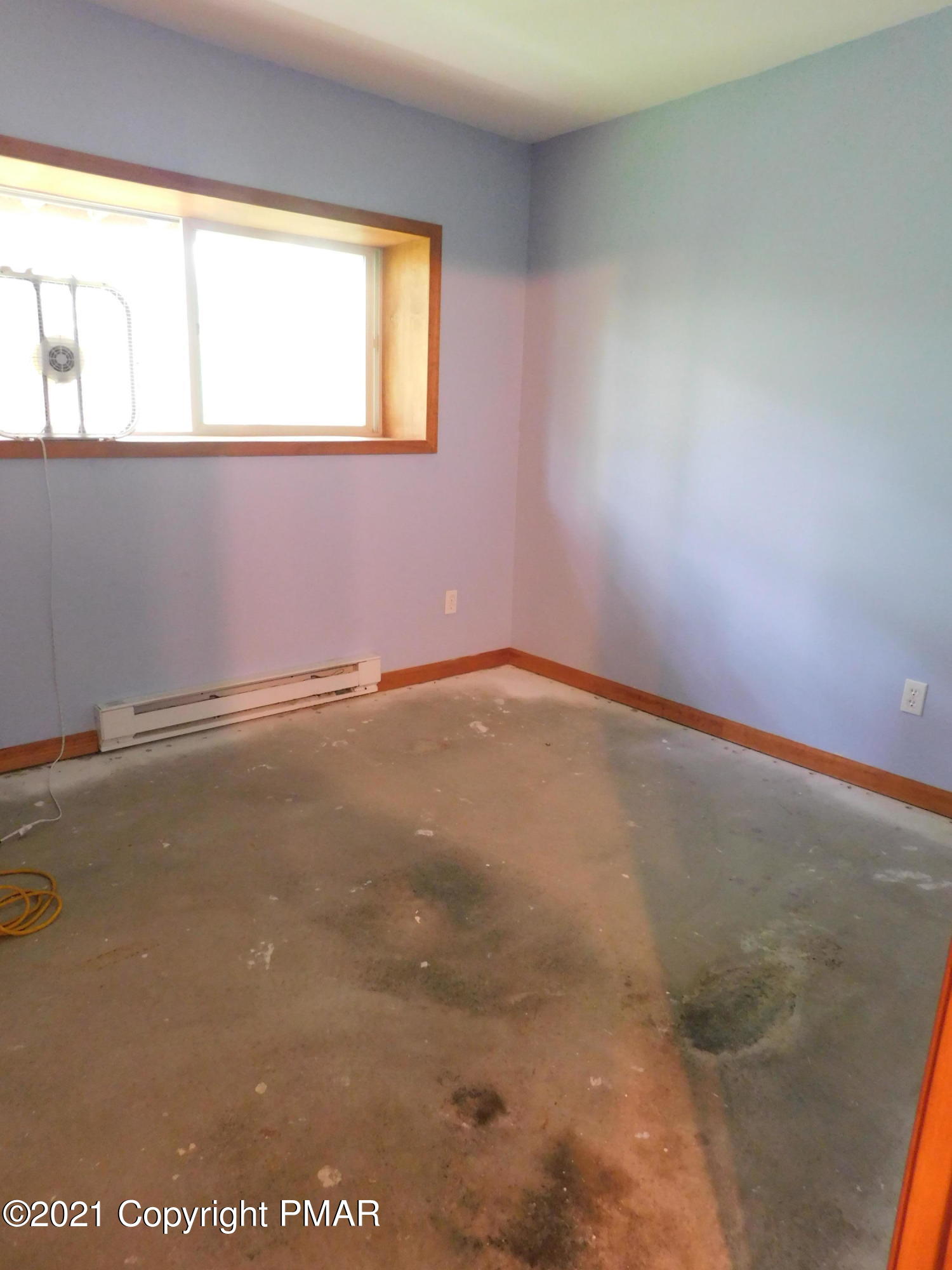 1051 Hampstead Road Bushkill, PA 18324 - Photo 9 of 40 an empty room with a window