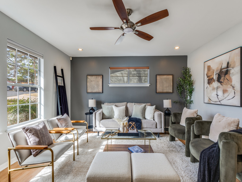 a living room with furniture or couch and a window