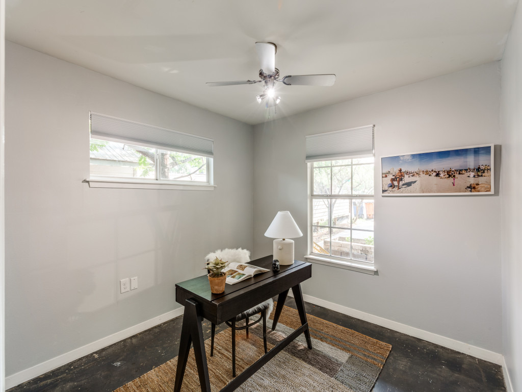 1705 Adriane Drive Austin, TX 78721 - Photo 13 of 31 a view of a workspace with furniture and a window