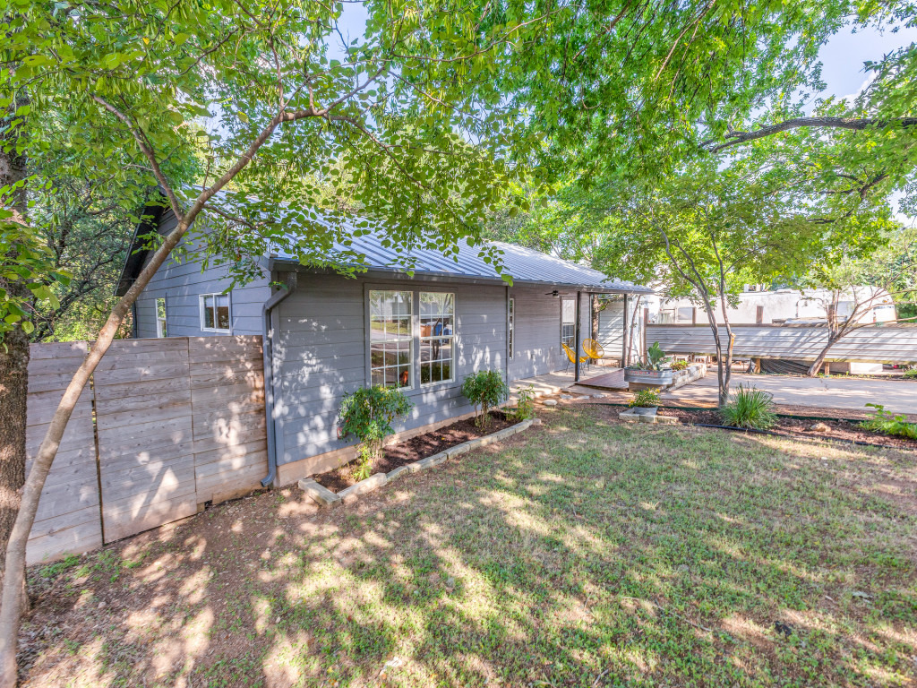 1705 Adriane Drive Austin, TX 78721 - Photo 17 of 31 a front view of a house with garden