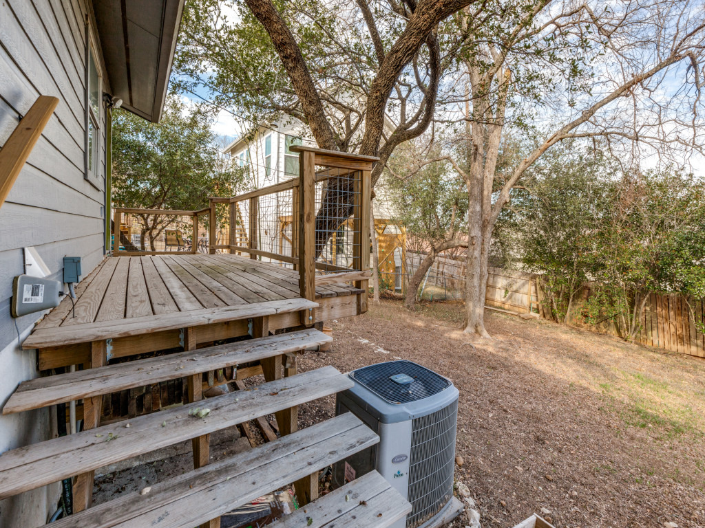 1705 Adriane Drive Austin, TX 78721 - Photo 23 of 31 a front view of a house with a yard