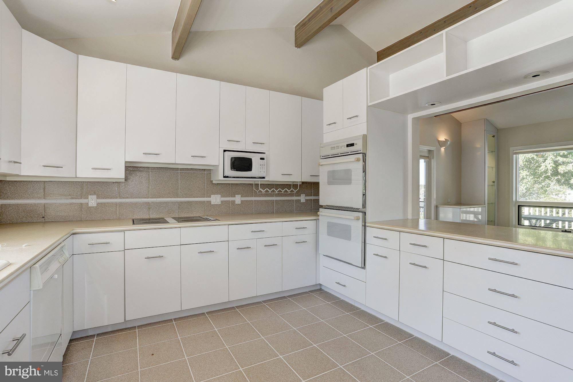 1610 Holly Tree Road Baltimore, MD 21220 - Photo 11 of 29 Kitchen W/PASS THROUGH TO DINING/EXPOSED BEAM CEIL