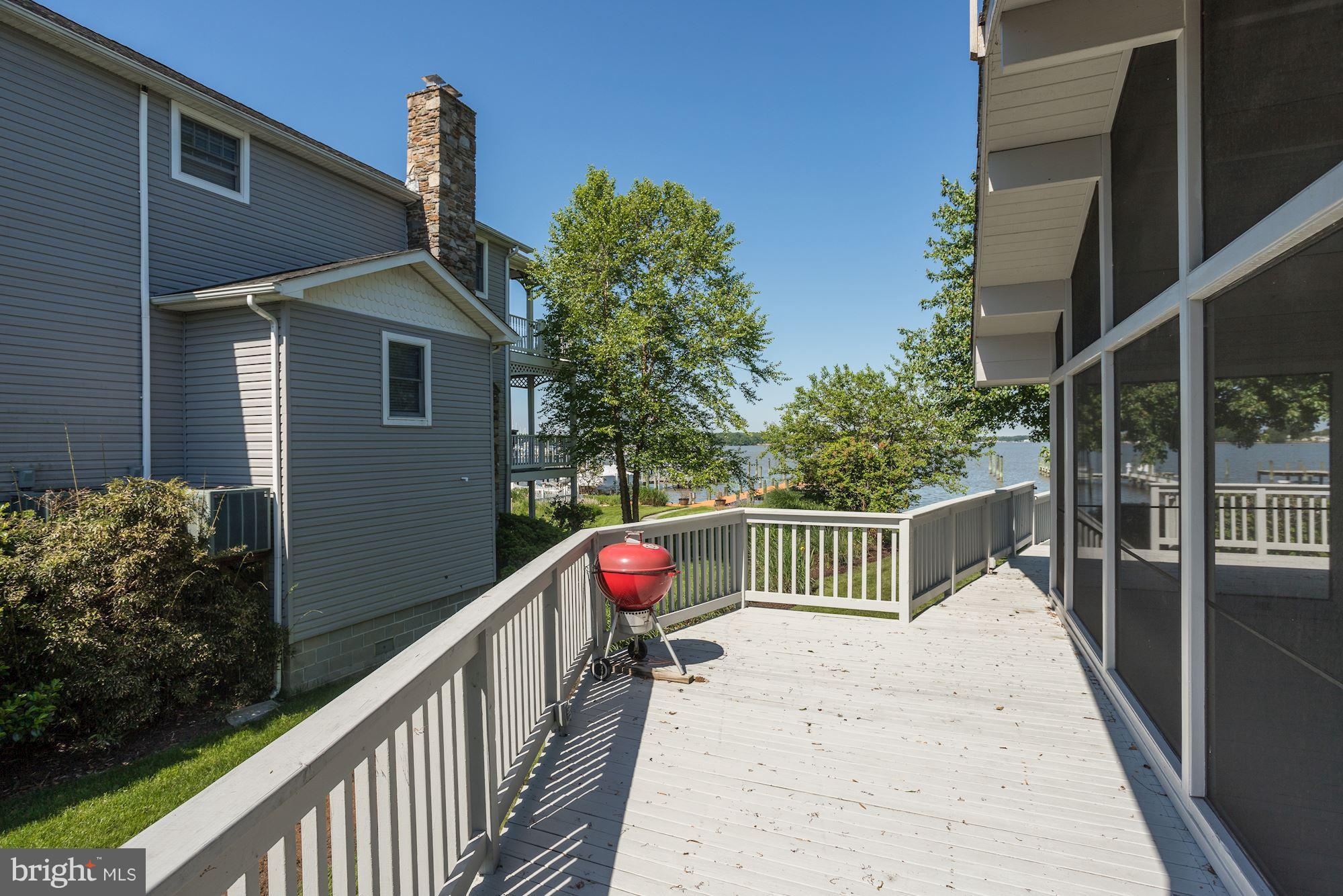 1610 Holly Tree Road Baltimore, MD 21220 - Photo 23 of 29 SIDE DECK OFF SCREENED PORCH